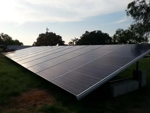 A completed ground-mount solar installation by Advanced Solar, photo 12