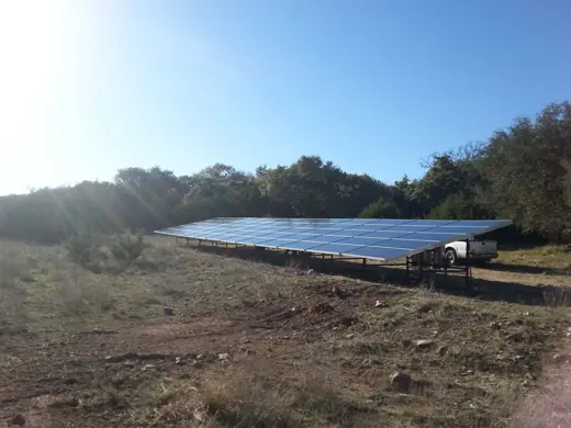 A completed ground-mount solar installation by Advanced Solar, photo 14