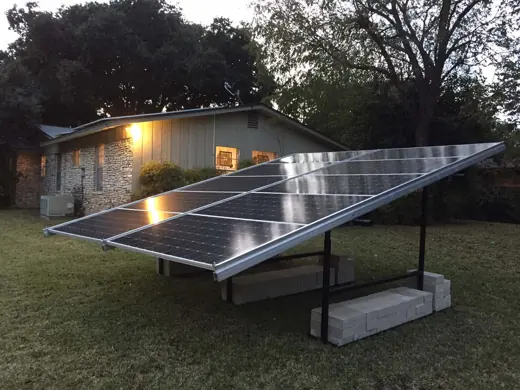 A completed ground-mount solar installation by Advanced Solar, photo 15