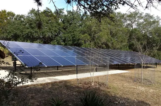 A completed ground-mount solar installation by Advanced Solar, photo 18