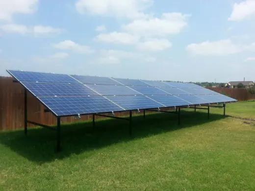 A completed ground-mount solar installation by Advanced Solar, photo 19