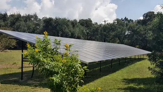 A completed ground-mount solar installation by Advanced Solar, photo 4